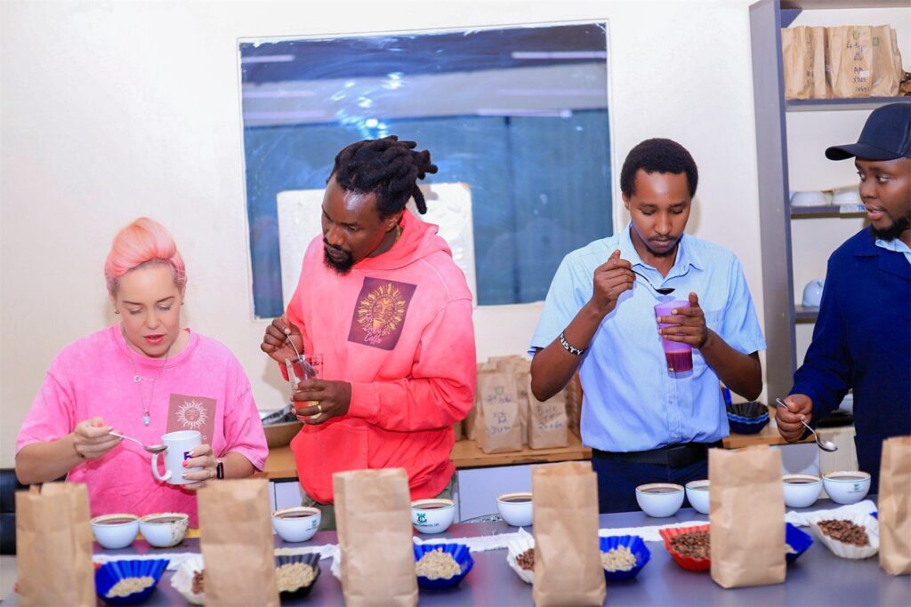 Mambo Leo founders cupping coffee with professional graders