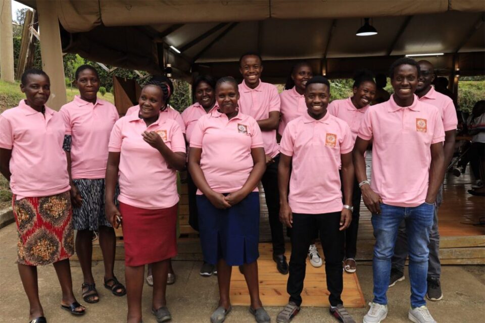 The Mambo Leo team gathered under a pavilion in Kenya