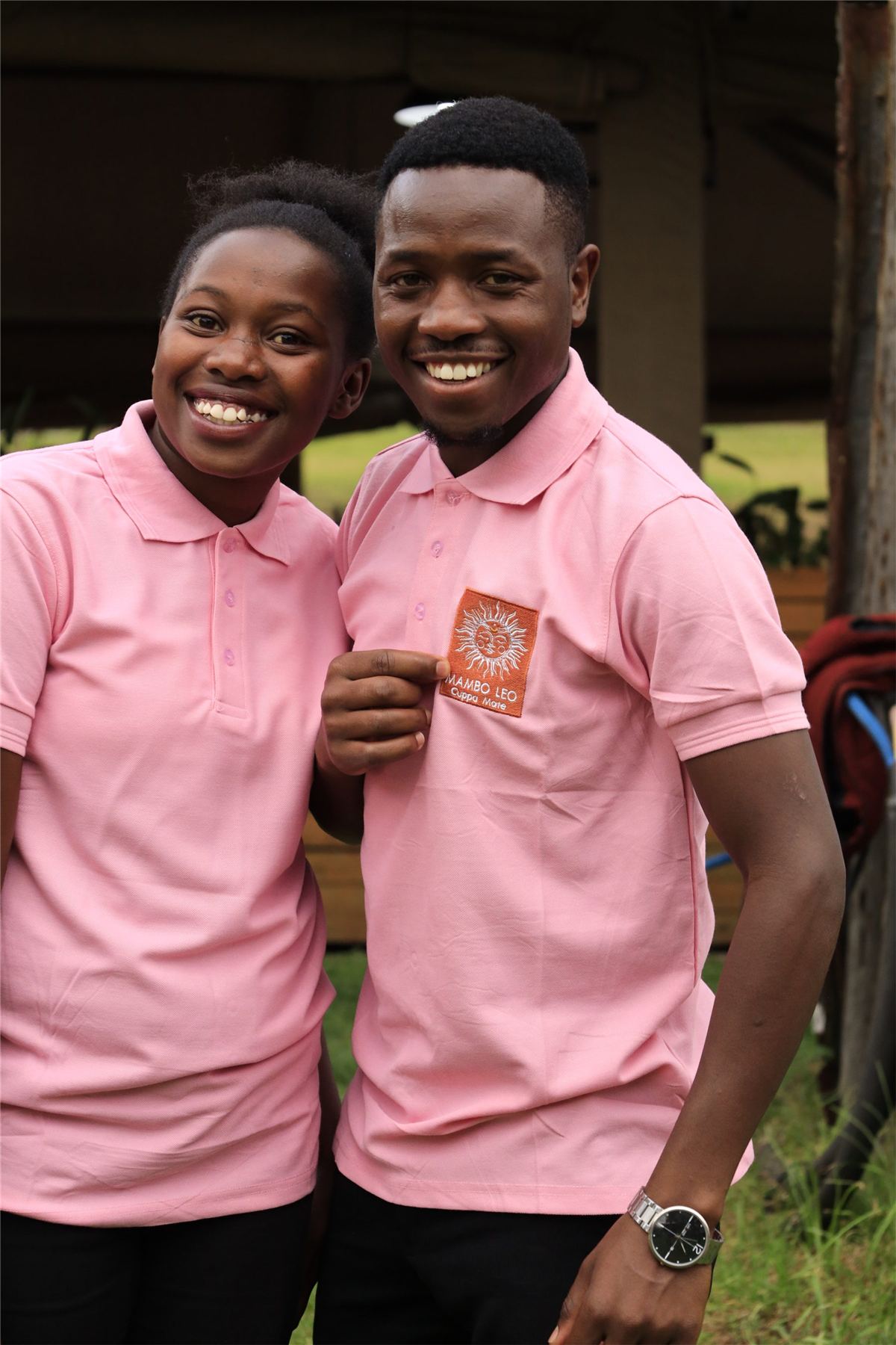 Two smiling members of the Mambo Leo team