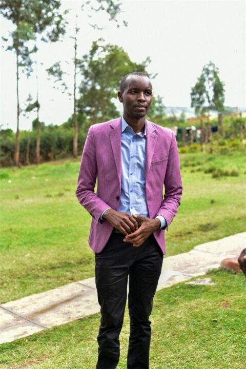 A community member photographed in a coffee field in Kenya